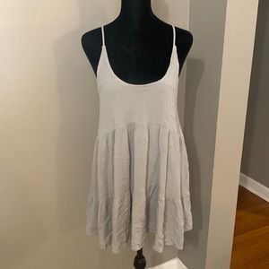 Adorable, mini gray crinkle dress with crisscross open back size S